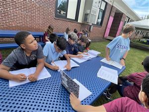 students looking at clouds